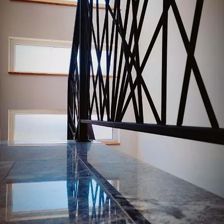 Skrline House *